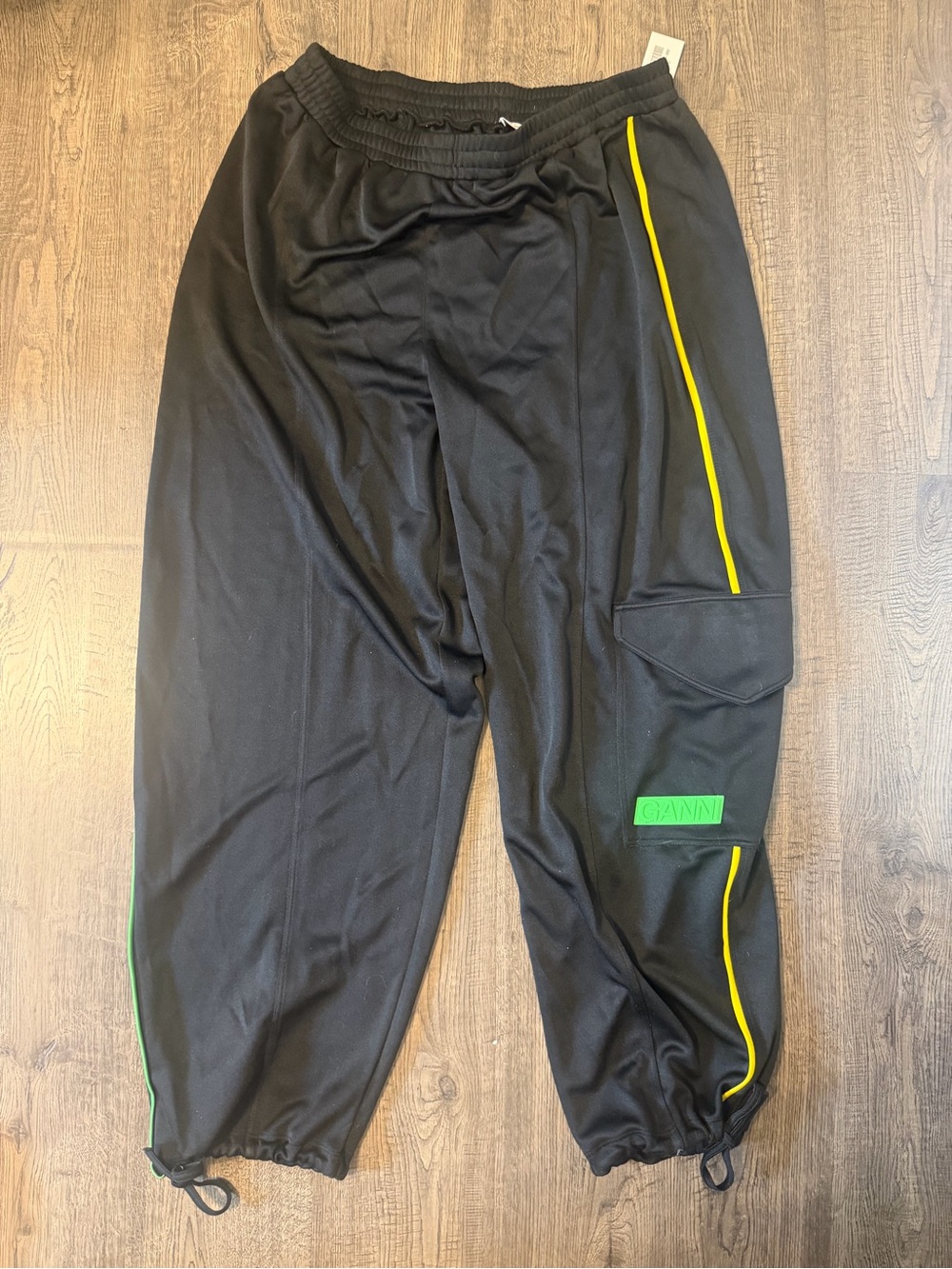 Ganni Black Track Pants with Yellow Piping & Green Logo Patch